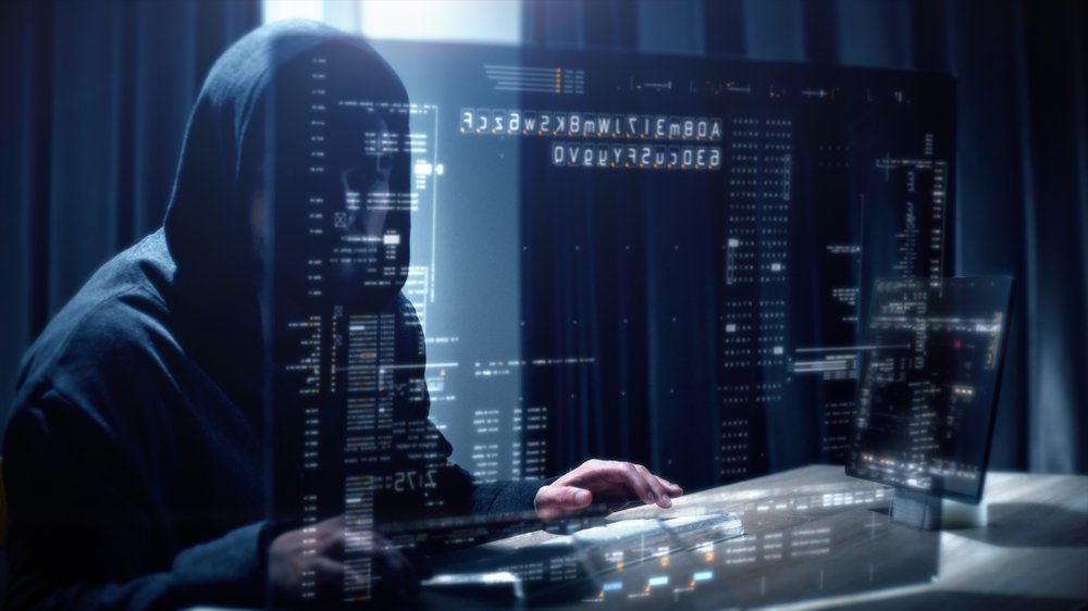 Futuristic,Cyber,Hacker,Operating,Under,The,Guise,Of,Anonymous,,Employs